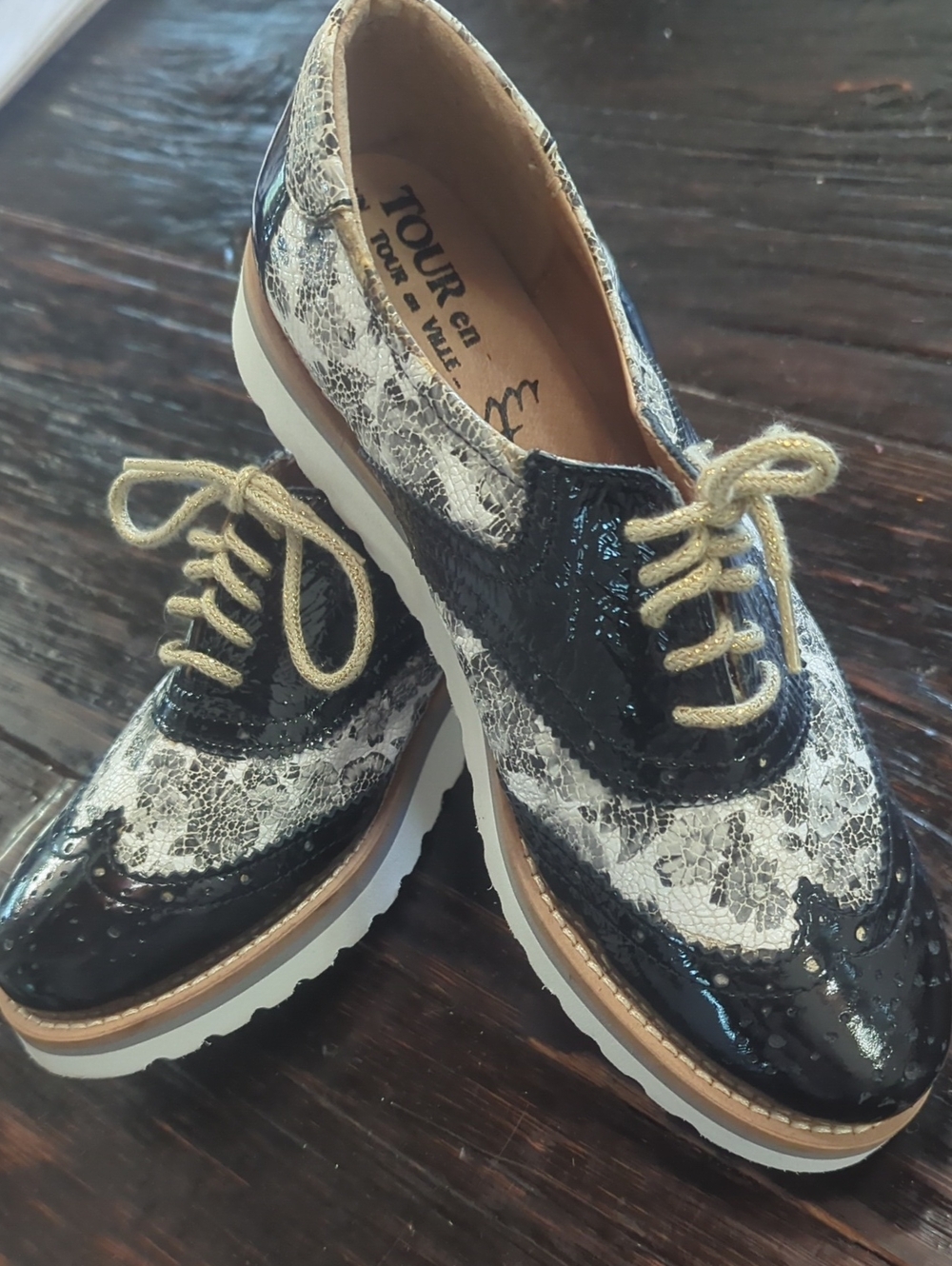 Women's Black and White Lace Wingtip Oxfords